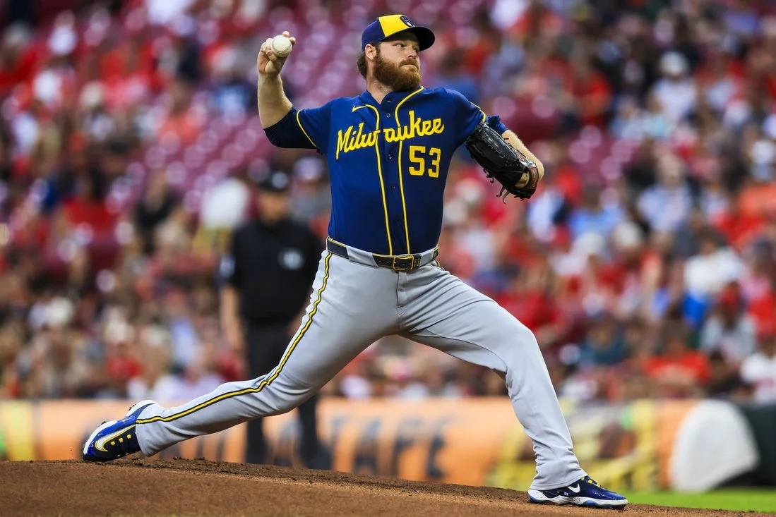 Brandon Woodruff Impresses on Return as Brewers Edge Reds in Extra Innings